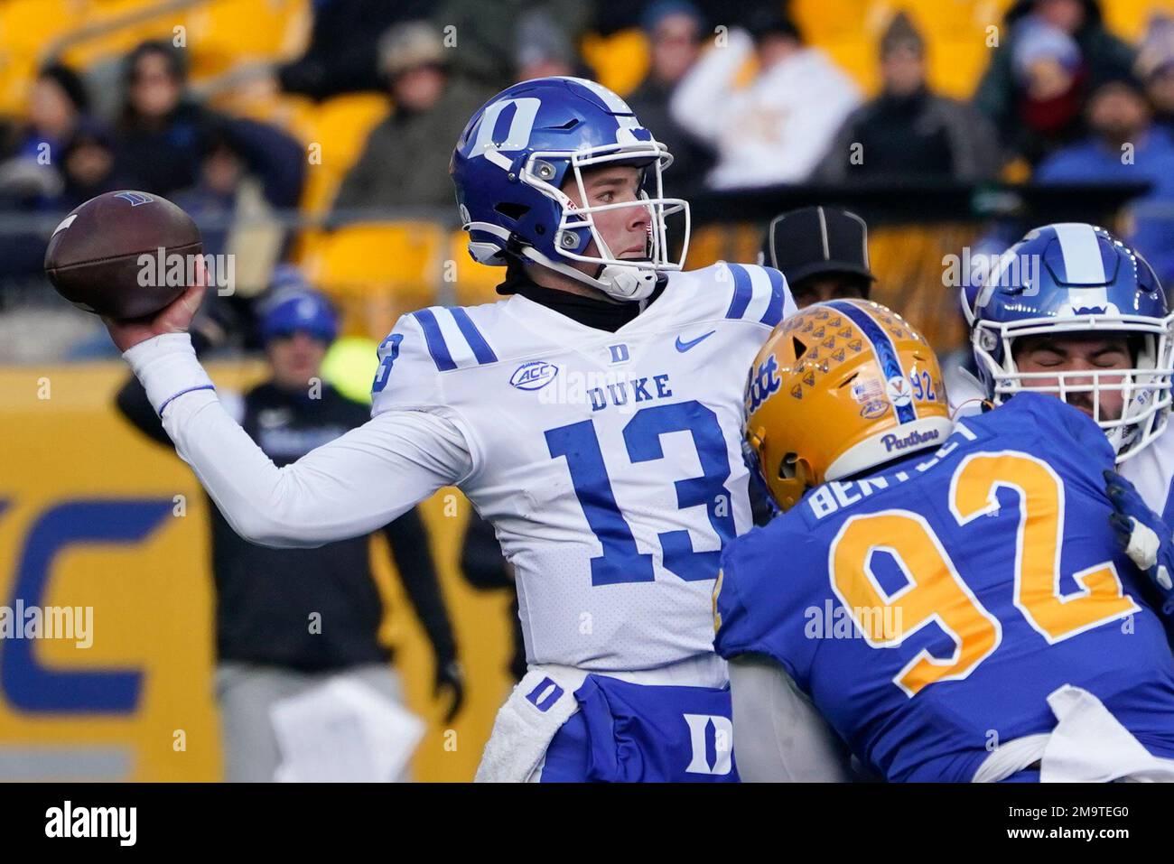 Duke quarterback Riley Leonard (13) passes as Pittsburgh defensive