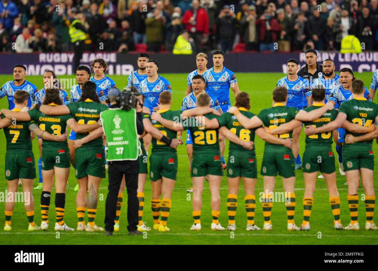 Samoa players perform the traditional Haka before the Rugby League World Cup final match between Australia and Samoa at the Old Trafford Stadium in Manchester, England, Saturday, Nov