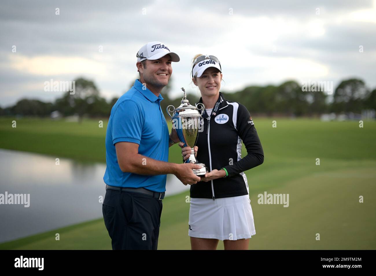 Nelly Korda, right, and her caddie Jason McDede pose with the