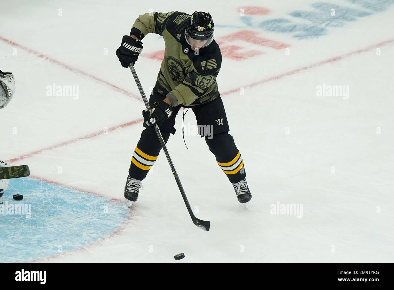 Boston Bruins Left Wing Brad Marchand (63) Wears A Green Jersey As Part ...