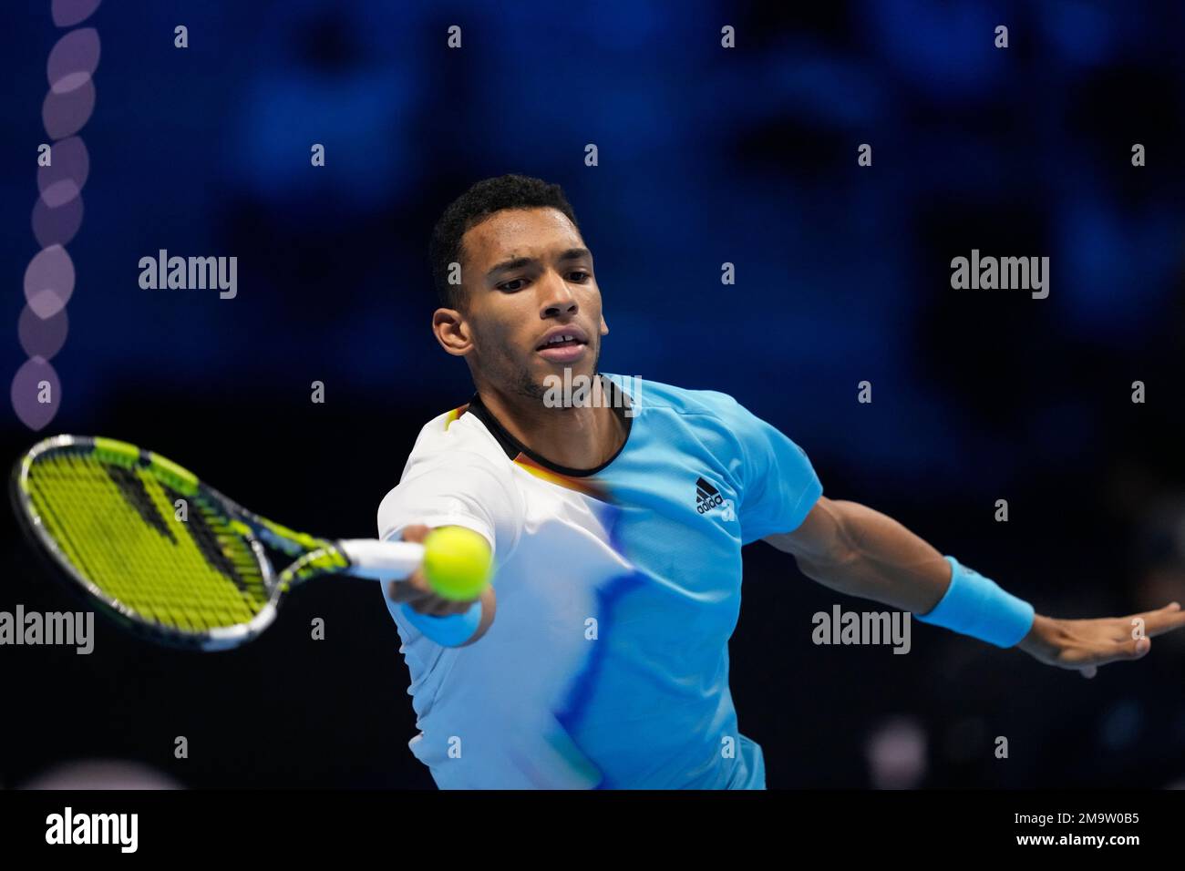 Canadas Felix Auger-Aliassime returns the ball to United States Taylor Fritz during their singles tennis match of the ATP World Tour Finals, at the Pala Alpitour in Turin, Italy, Thursday, Nov