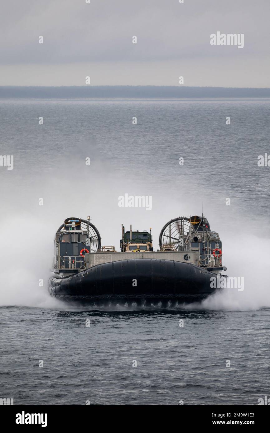 BALTIC SEA (May 20, 2022) – Landing Craft, Air Cushion 04, attached to Assault Craft Unit 4, approaches the Wasp-class amphibious assault ship USS Kearsarge (LHD 3) May 20, 2022. Kearsarge, flagship of the Kearsarge Amphibious Ready Group and embarked 22nd Marine Expeditionary Unit, is participating in the Estonian-led exercise Siil 22 (Hedgehog 22 in English). Hedgehog 22 brings together members of the Estonian Defense Force and U.S. Sailors and Marines under Task Force 61/2 to enhance Allied interoperability and preserve security and stability in the Baltic region. Stock Photo