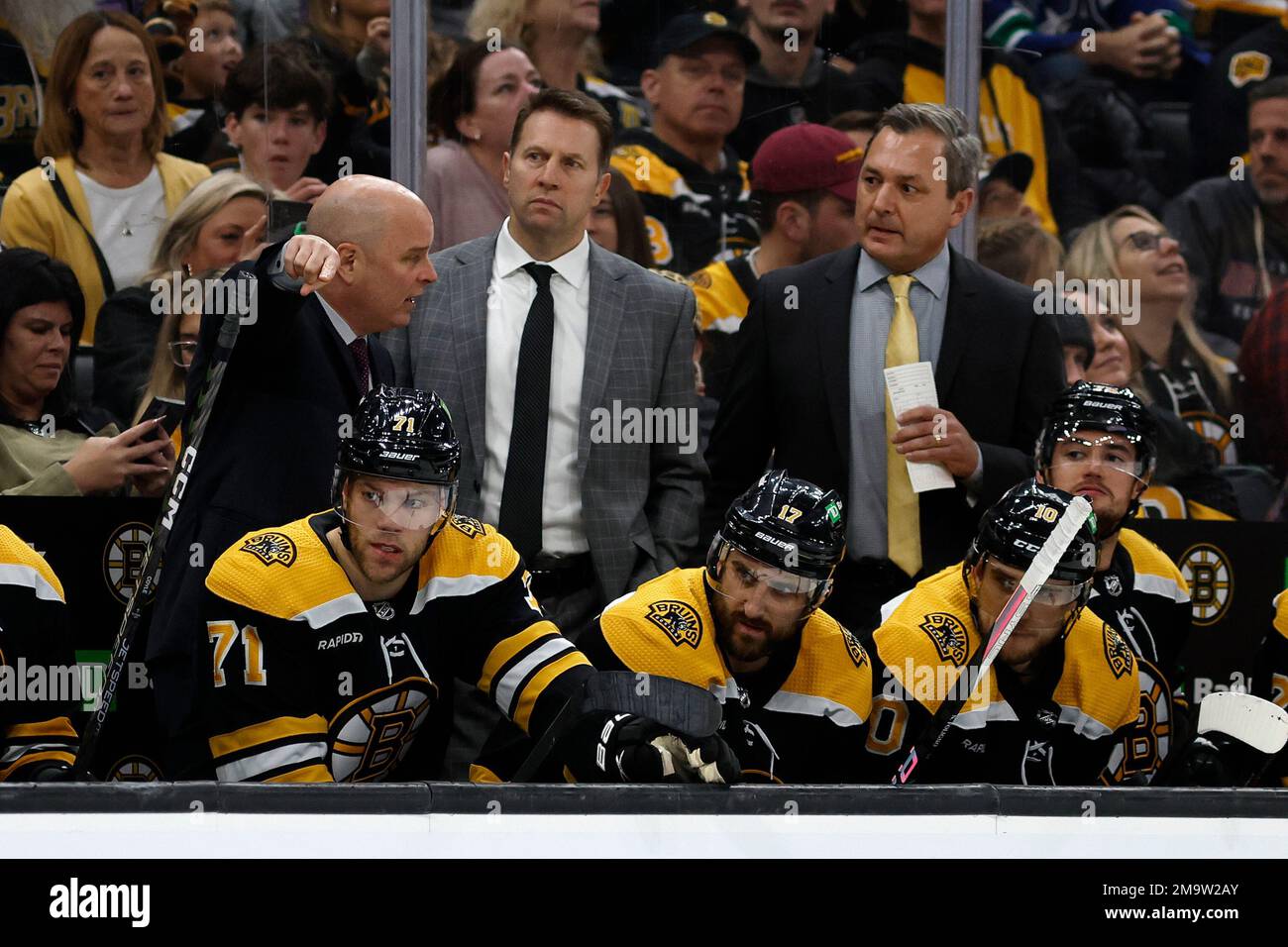 Boston Bruins Head Coach Jim Montgomery, Left, Talks With Assistant ...