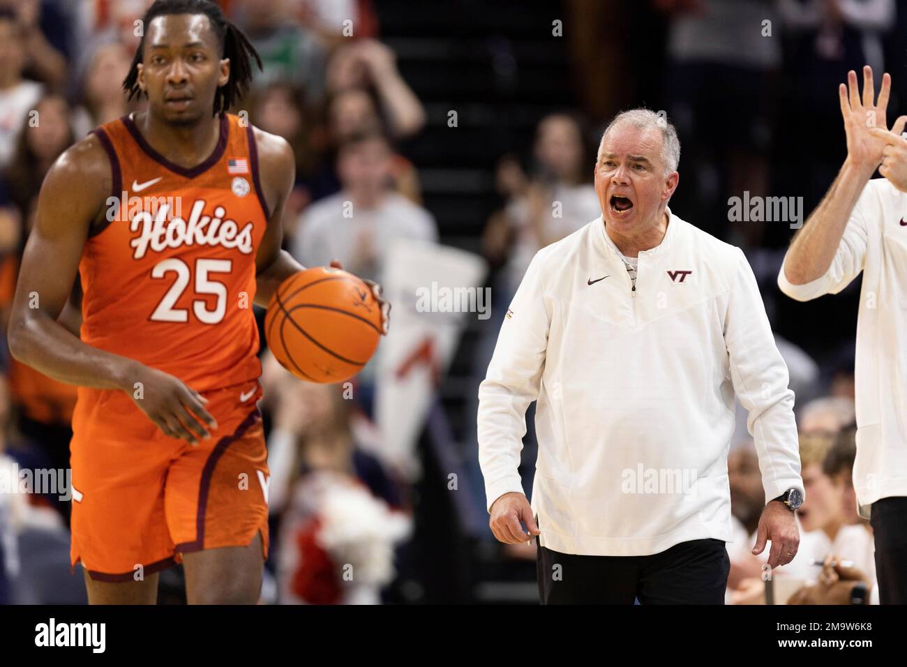 Virginia Tech head coach Mike Young yells to his players during the first  half of an NCAA college basketball game against Virginia in  Charlottesville, Va., Wednesday, Jan. 18, 2023. (AP Photo/Mike Kropf