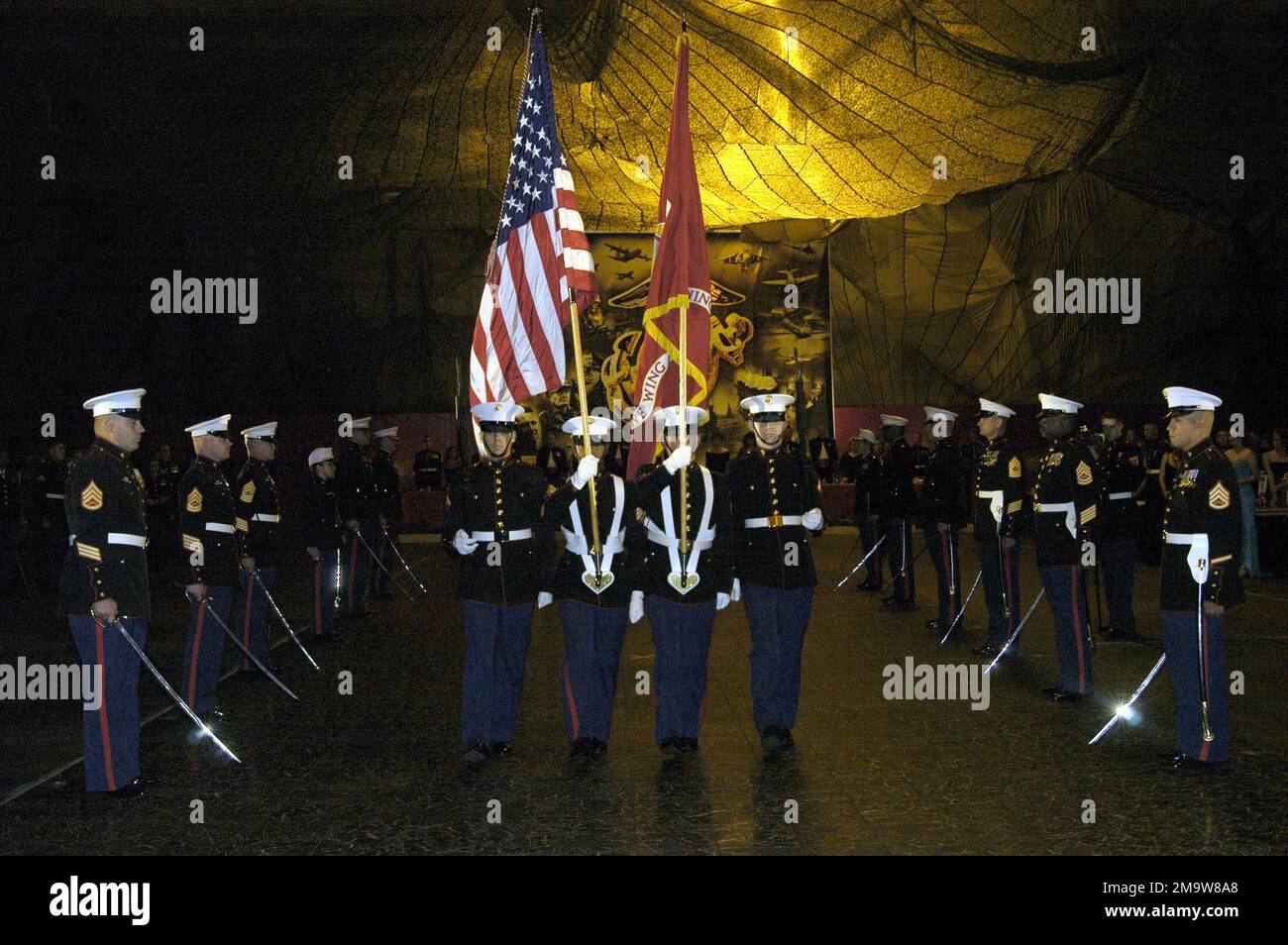 The Color Guard displays presents the colors at the Marine Air Ground Force-14 (MAG-14) and Group-27, US Marine Corps (USMC) Birthday Ball, at Cherry Point, North Carolina. Base: Mcas, Cherry Point State: North Carolina (NC) Country: United States Of America (USA) Stock Photo