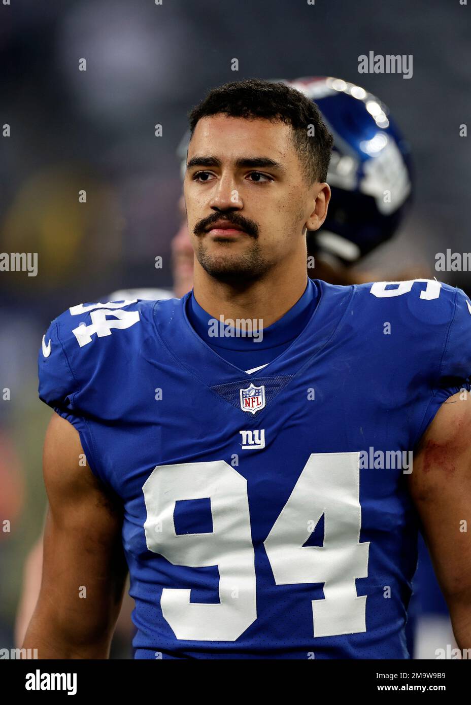 New York Giants linebacker Elerson Smith (94) walks off the field after an  NFL football game against the Houston Texans on Sunday, Nov. 13, 2022, in  East Rutherford, N.J. (AP Photo/Adam Hunger