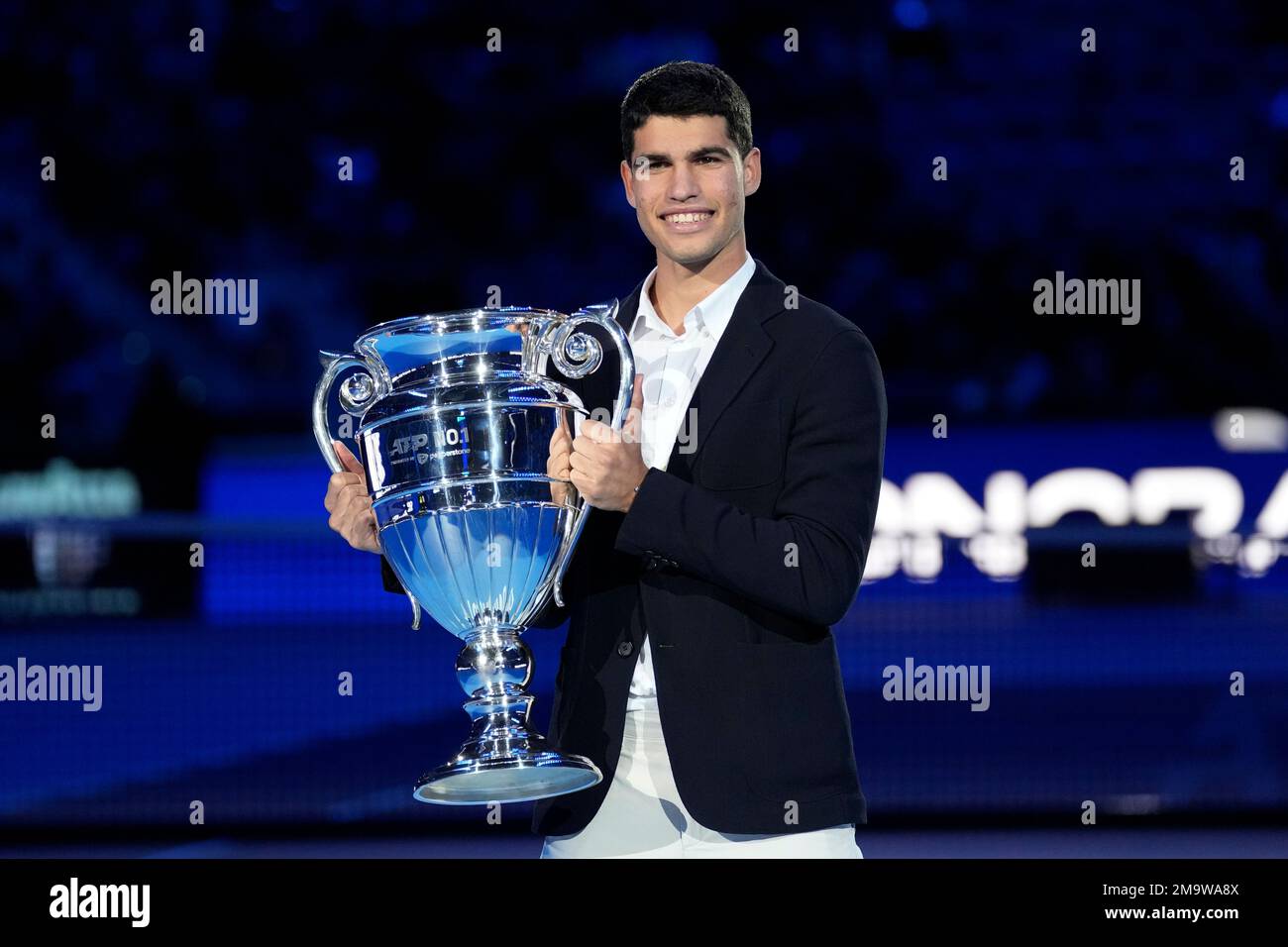 Spain's Carlos Alcaraz holds the trophy as ATP world best player at the ATP  World Tour Finals, at Pala Alpitour, in Turin, Italy, Wednesday, Nov. 16,  2022. Alcaraz was presented with the
