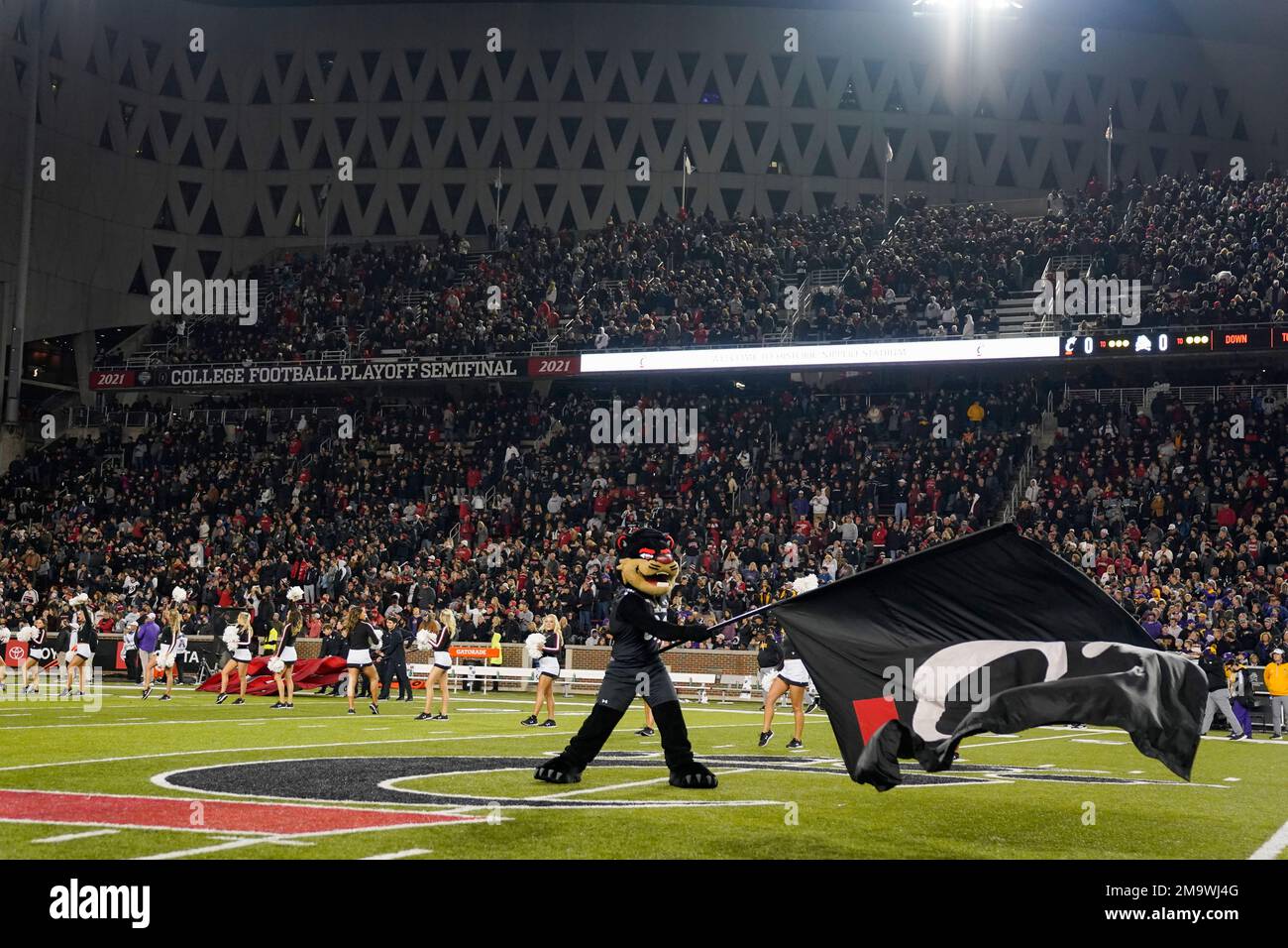 The Cincinnati bearcat mascot performs during an NCAA college football game against East