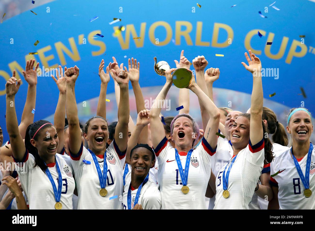 Annalee Rippe FILE - United States' Megan Rapinoe lifts up the trophy after winning ...