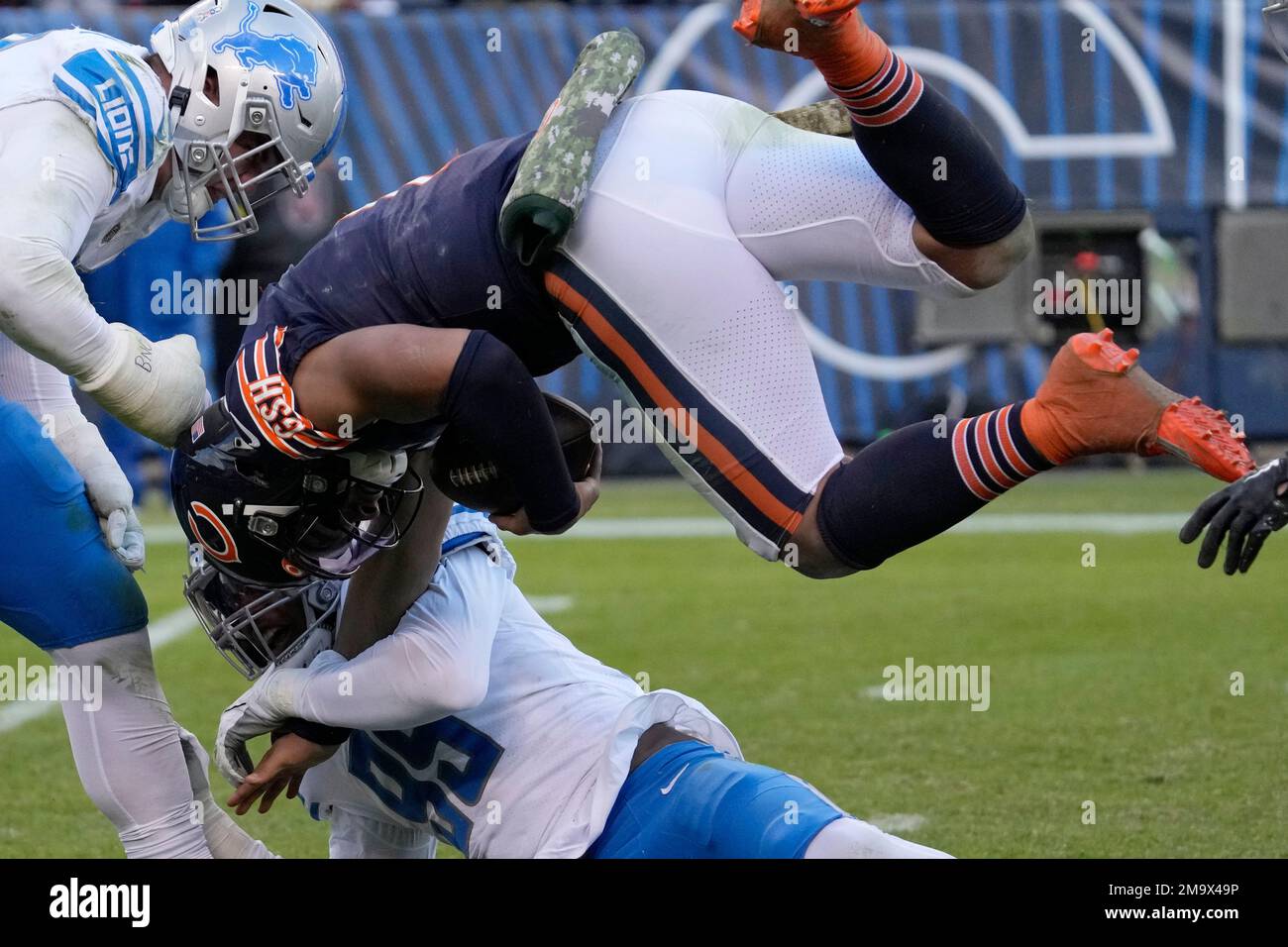 A Chicago Bears fan holds a quarterback Justin Fields jersey before an NFL  football game against the Houston Texans Sunday, Sept. 25, 2022, in  Chicago. (AP Photo/Nam Y. Huh Stock Photo - Alamy