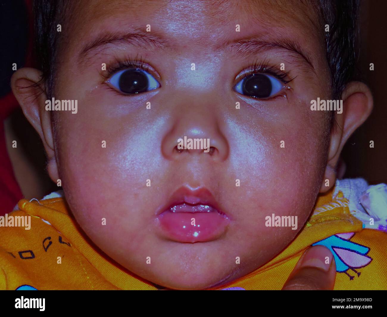Raiganj,West Bengal,India, 11-11-2015, infant face expression Stock Photo