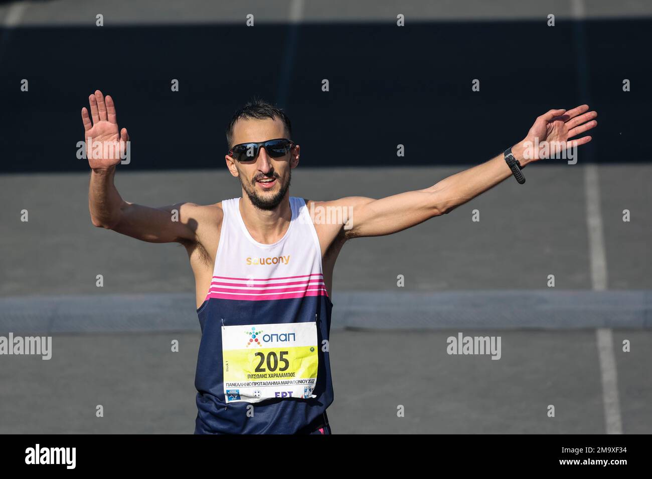 Greek runner Charalampos Pitsolis reacts after winning the 39th Athens  Marathon, in Athens, Greece, Sunday, Nov. 13, 2022. (AP Photo/Yorgos  Karahalis Stock Photo - Alamy