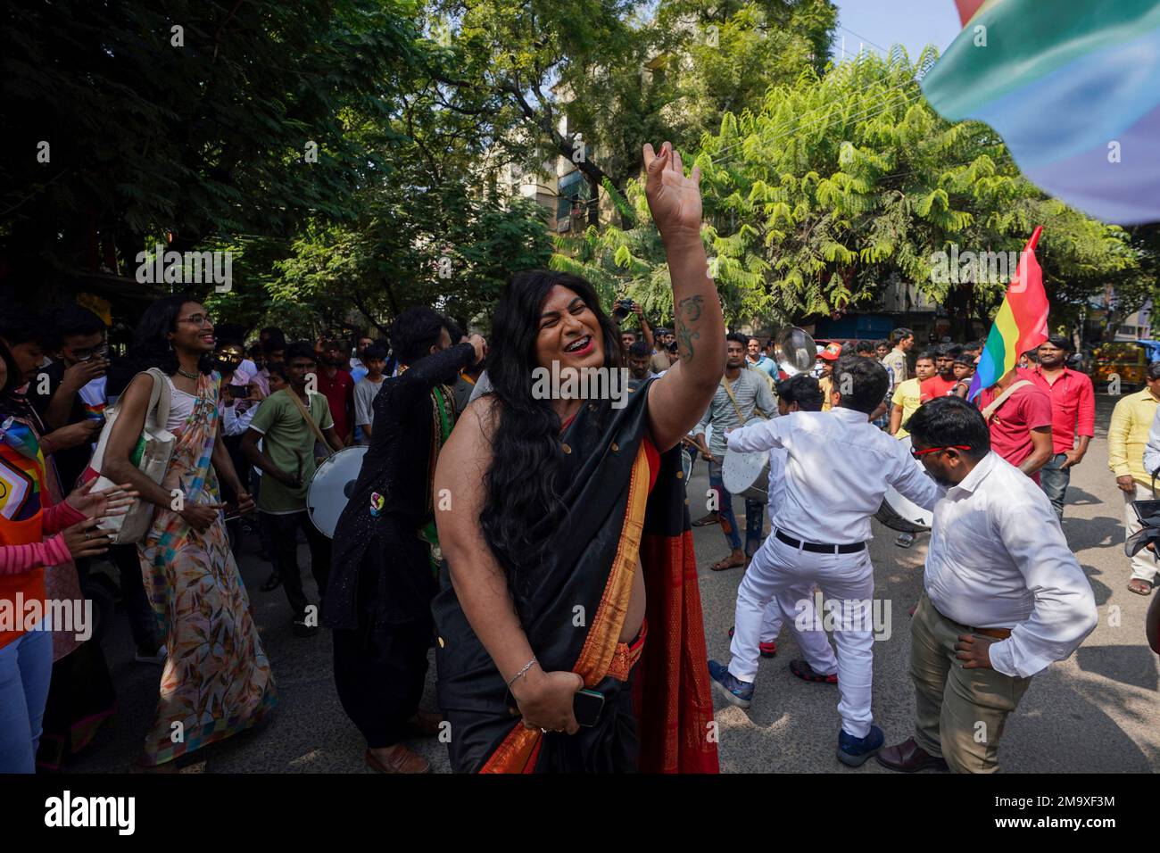 Members of the LGBTQ community and their supporters participate in a