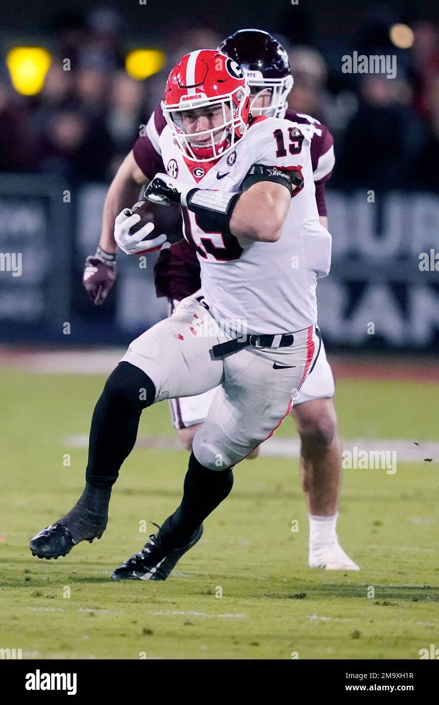 tight end Brock Bowers (19) runs upfield after a pass reception