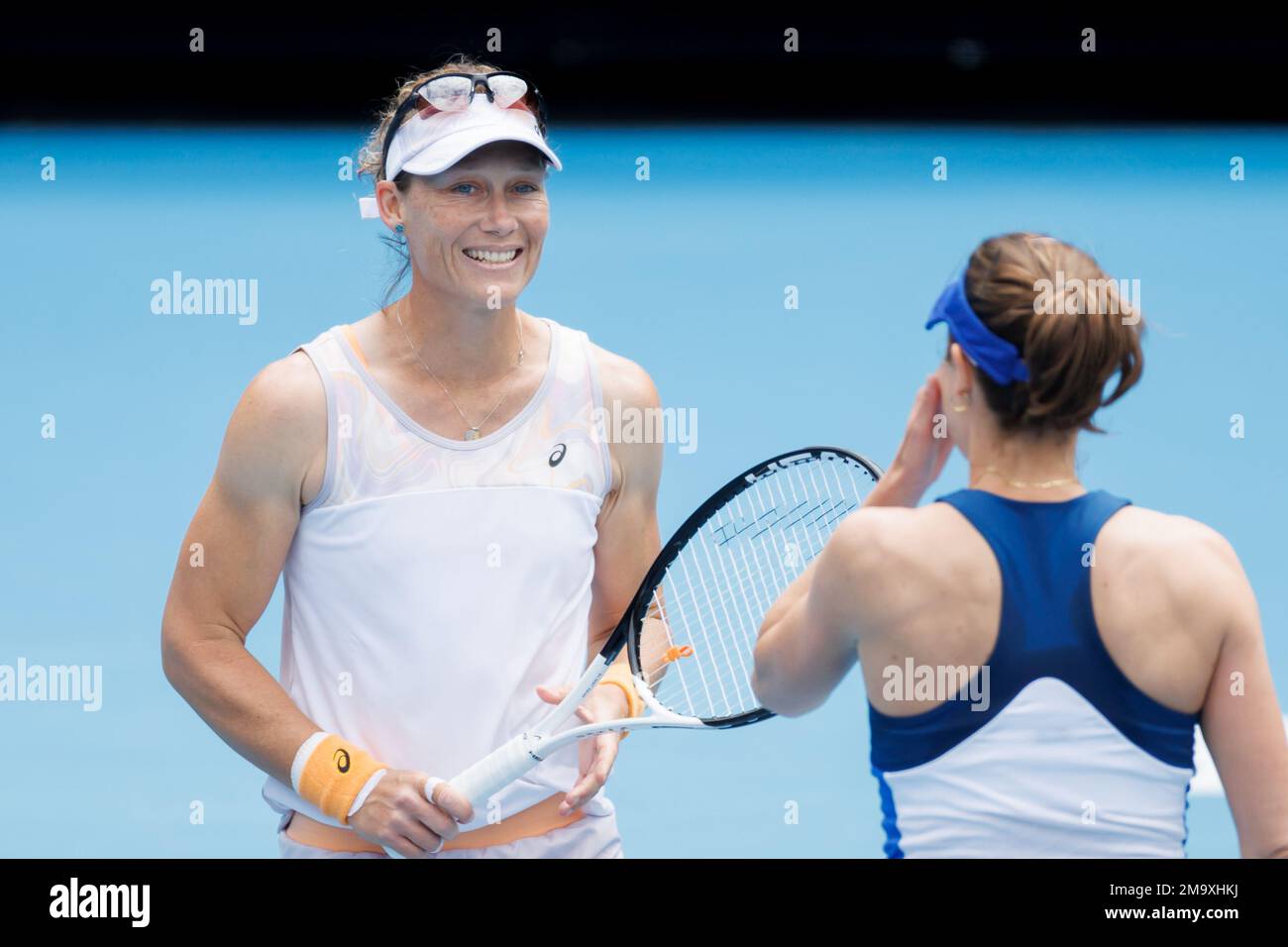 Melbourne, Australia. 19th Jan, 2023. Samantha STOSUR embraces her doubles partner Aiize CORNET of France after losing her match and retires from professional tennis after playing a match against 11th seed Zhaoxuan YANG of China and Hao-Ching CHAN of Taipei in the 1st round Women's Doubles match on day 4 of the 2023 Australian Open on Kia Arena, in Melbourne, Australia. Sydney Low/Cal Sport Media. Credit: csm/Alamy Live News Stock Photo