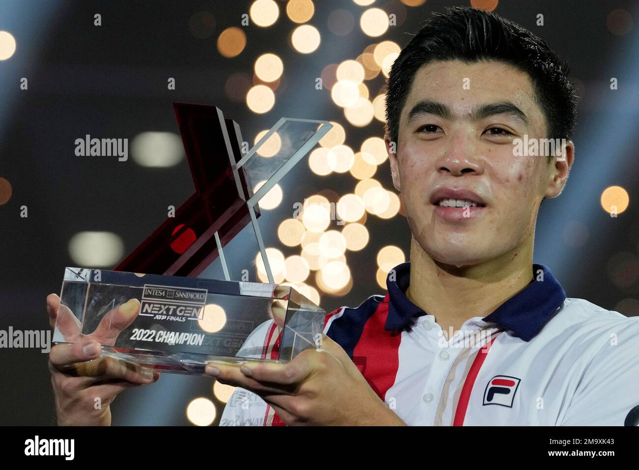 Winner United States' Brandon Nakashima holds a trophy during a medal