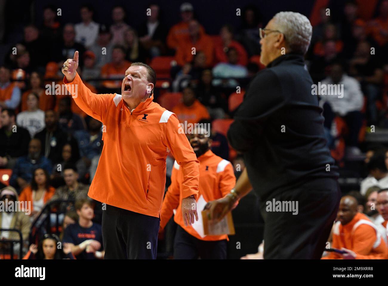 Illinois' coach Brad Underwood signals as Kansas City's coach Marvin