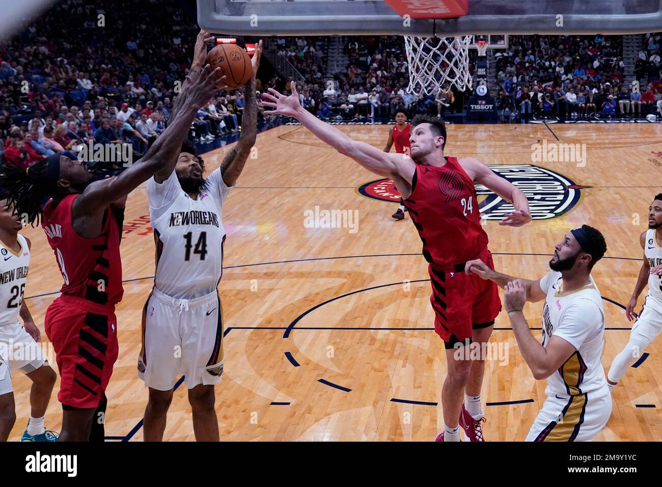 New Orleans Pelicans forward Brandon Ingram (14) battles under the basket with Portland Trail