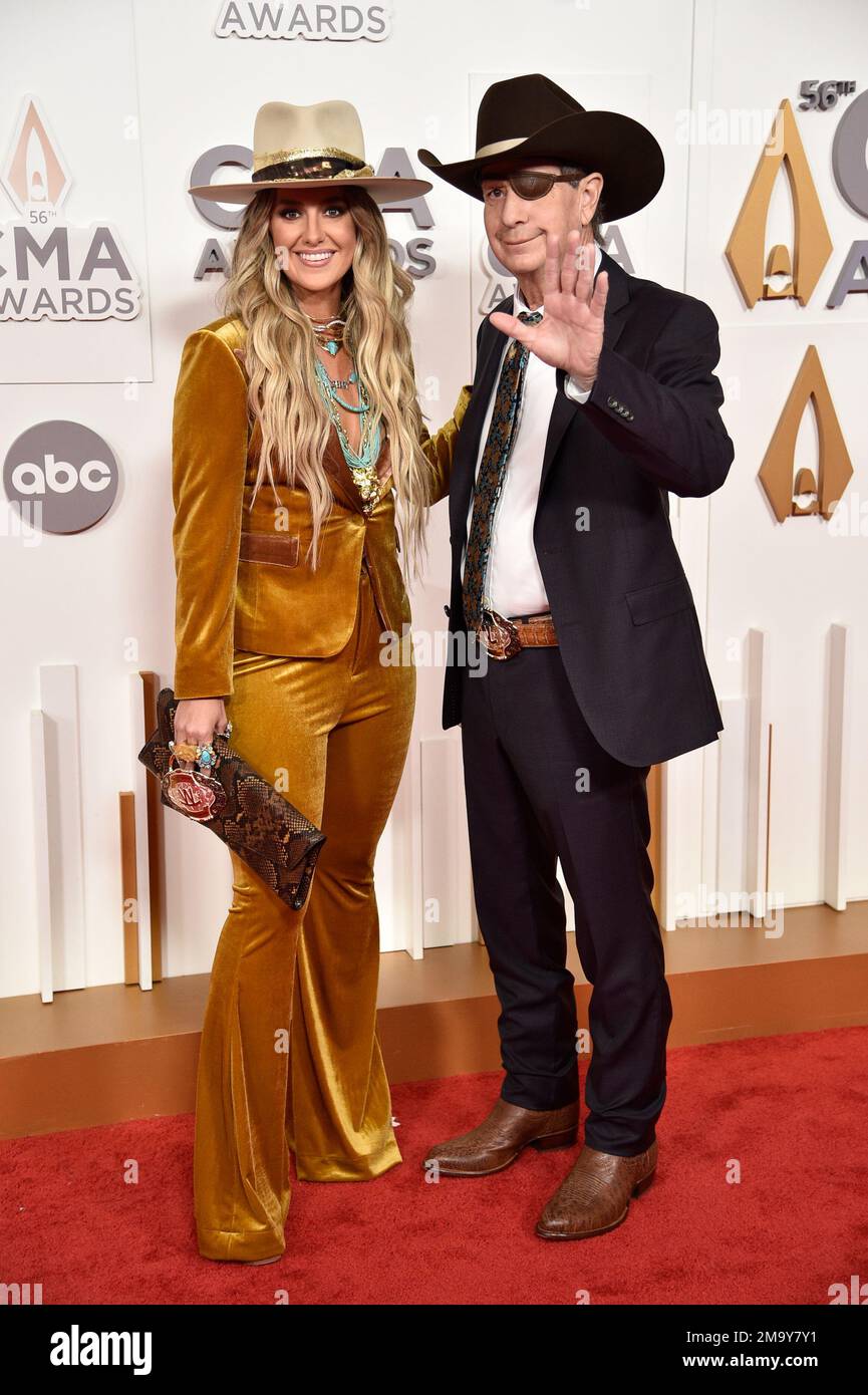 Lainey Wilson, left, and her father Brian Wilson arrive at the 56th