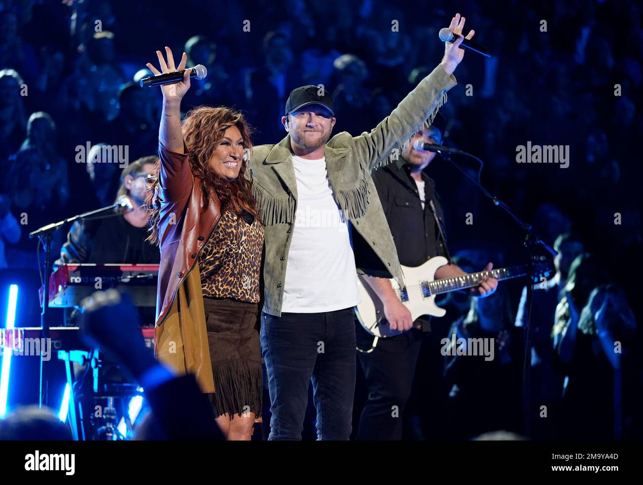 Jo Dee Messina, left, and Cole Swindell perform "She Had Me at Heads