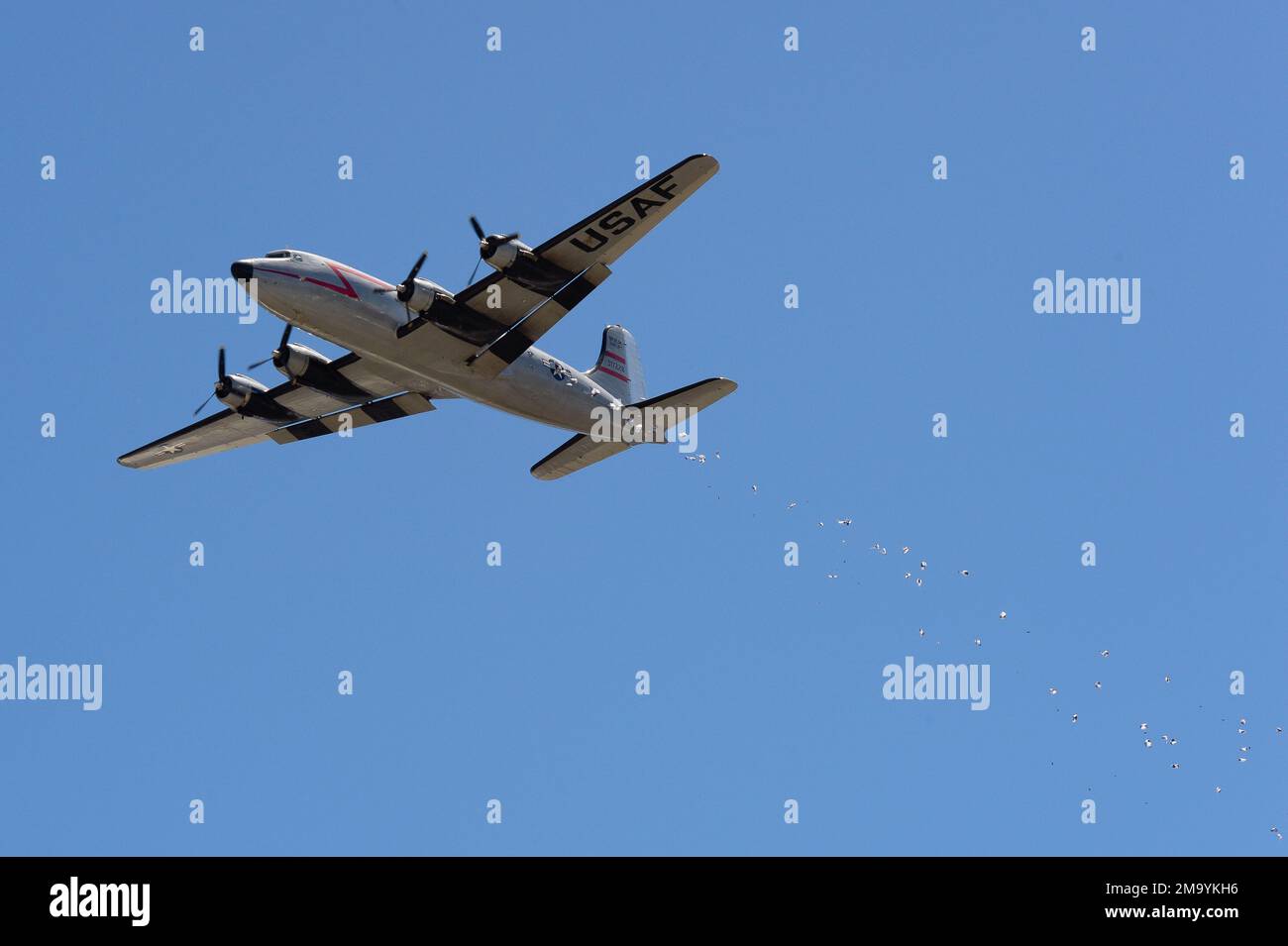 Parachuted candy is dropped from a C54 Skymaster in Spanish Fork, Utah