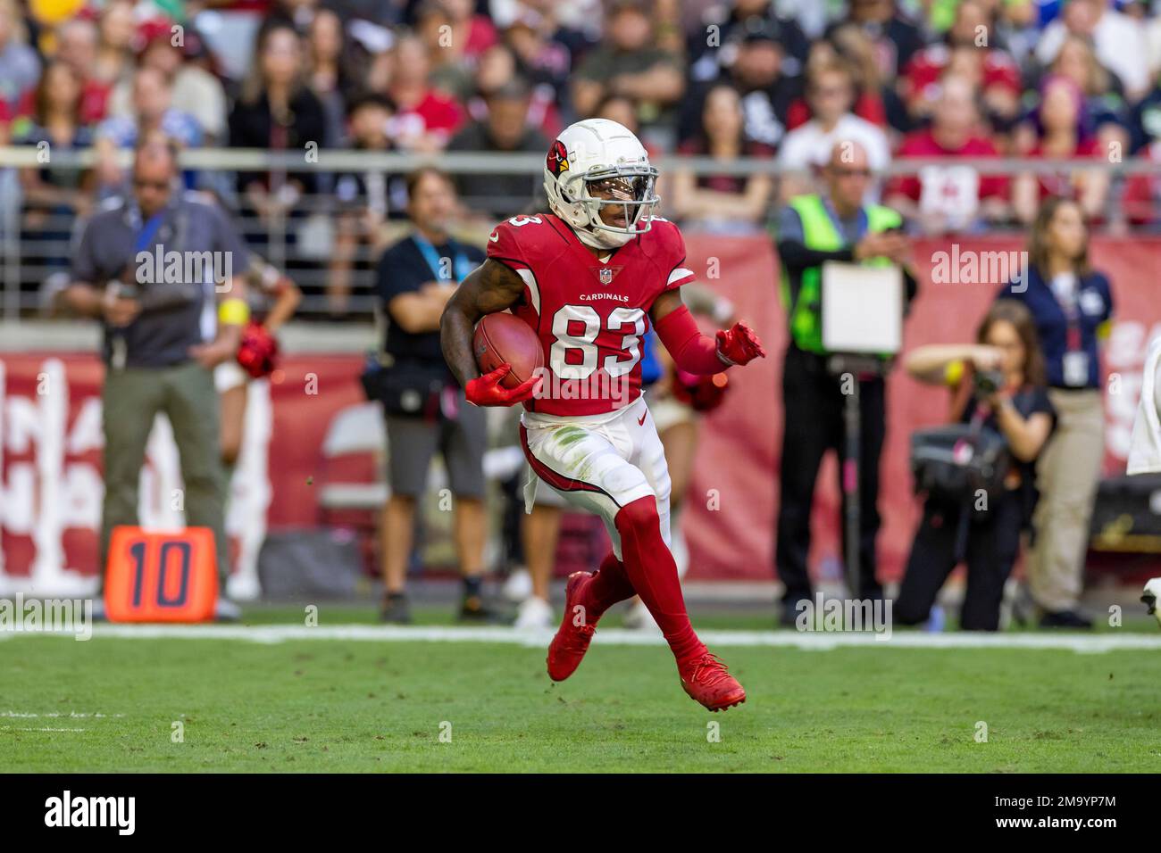 Arizona Cardinals wide receiver Greg Dortch (83) returns a kickoff