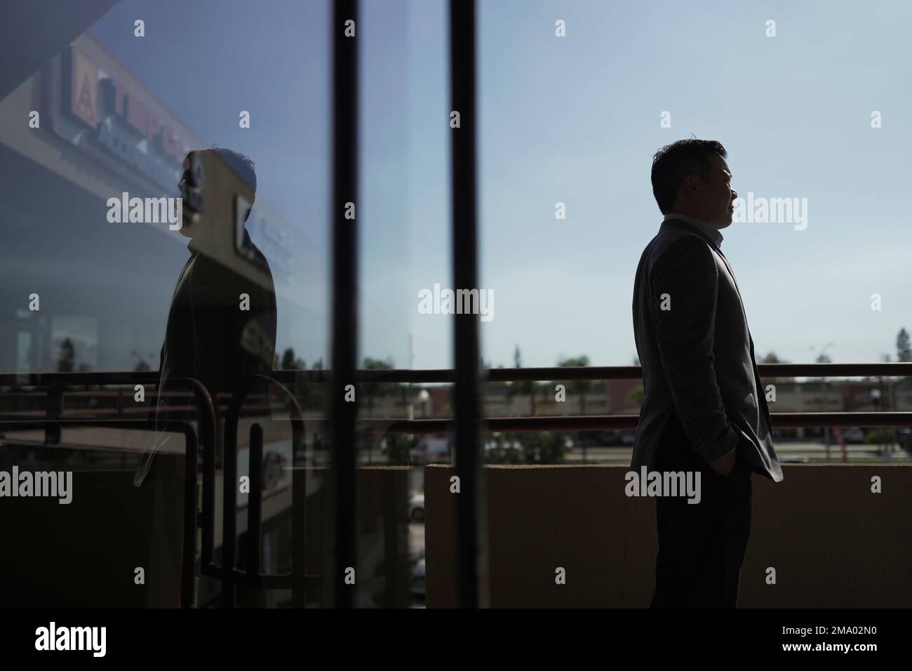 Kyle H. Tang, a 38yearold VietnameseAmerican attorney, stands for a photo outside his office