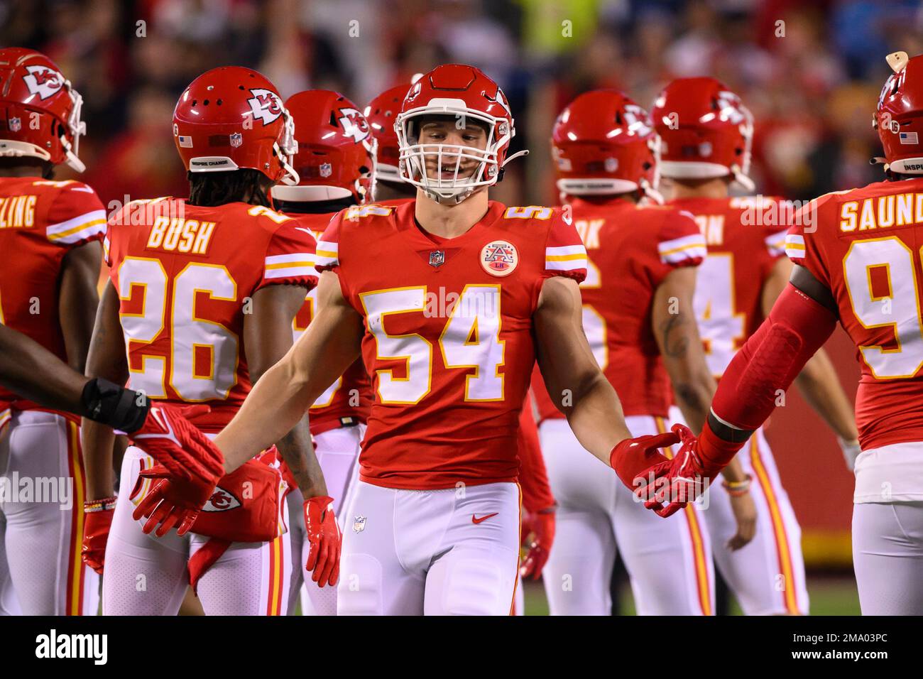 Kansas City Chiefs linebacker Leo Chenal (54) is greeted by