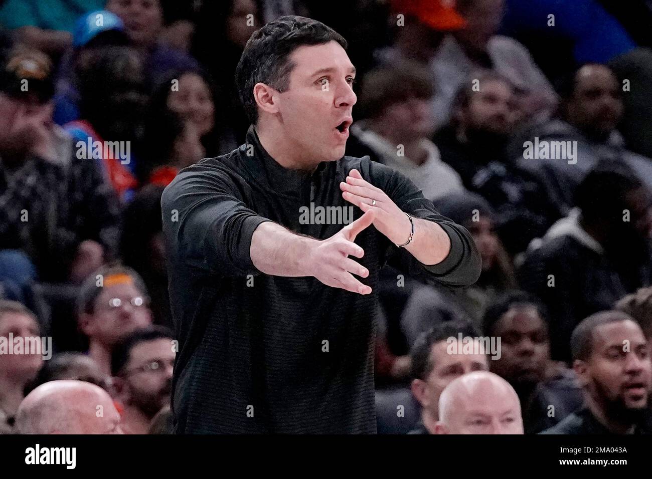 Oklahoma City Thunder head coach Mark Daigneault gestures in the second