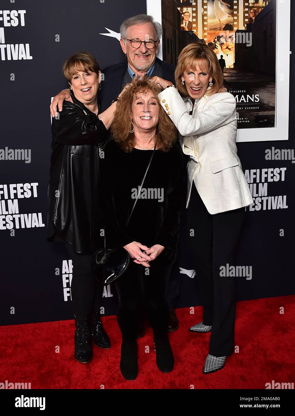Steven Spielberg, center, poses with his sisters Sue Spielberg, from