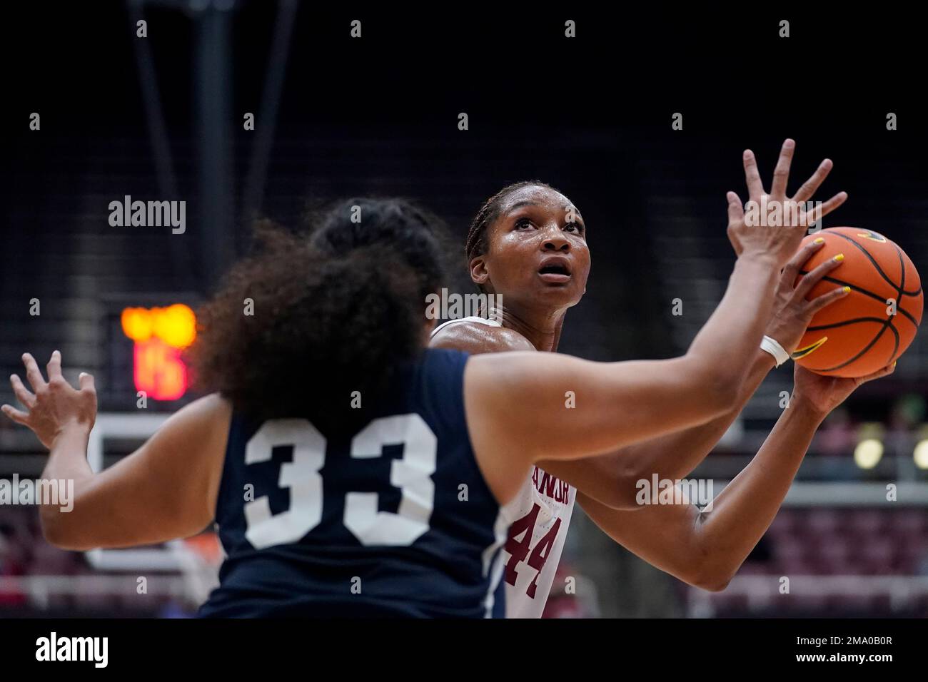 Stanford forward Kiki Iriafen (44) looks for a shooting lane while