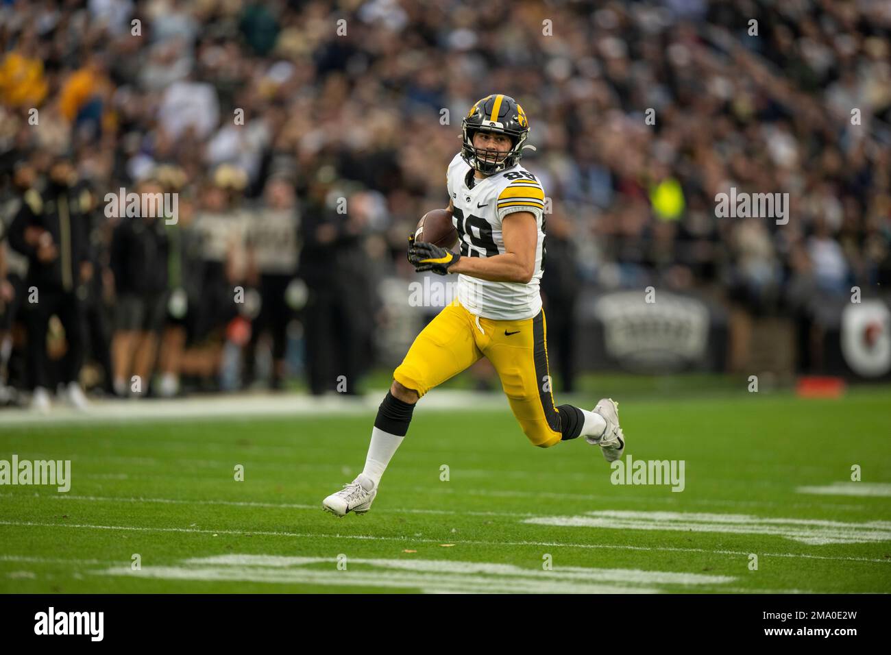 Iowa Wide Receiver Nico Ragaini (89) Runs The Ball Down Field During ...