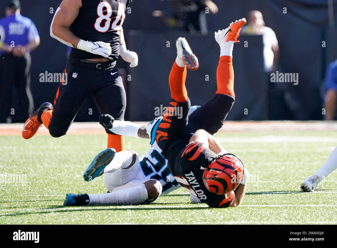 Cincinnati Bengals wide receiver Trent Taylor (11) is toppled by
