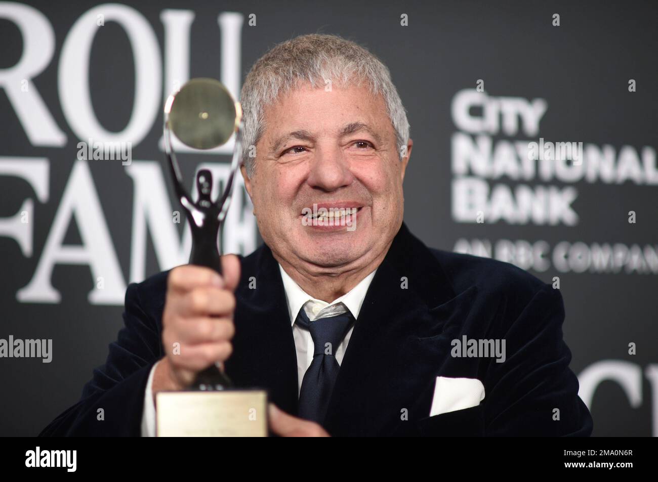 Inductee Allen Grubman poses in the press room during the Rock & Roll