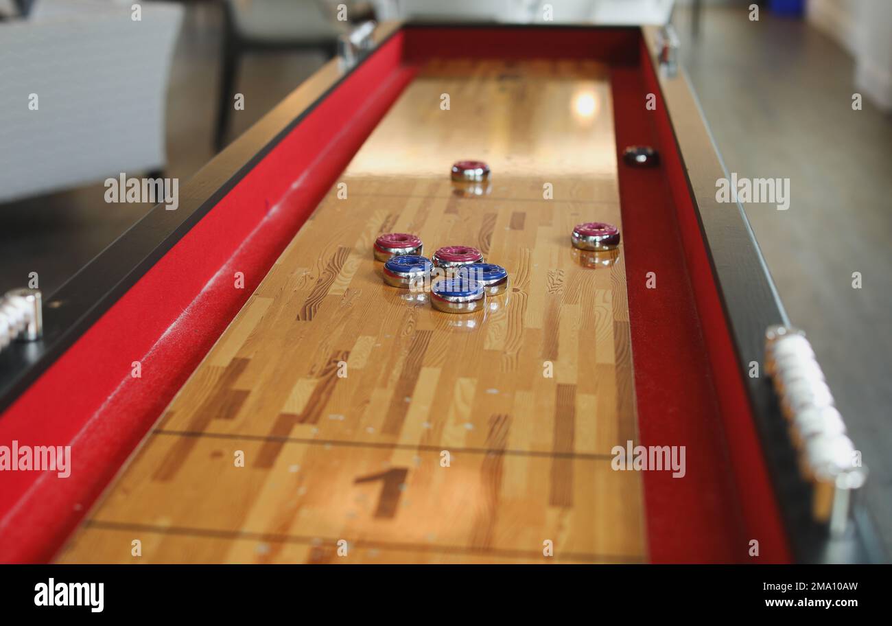 Shuffleboard american games sport recreation Stock Photo Alamy