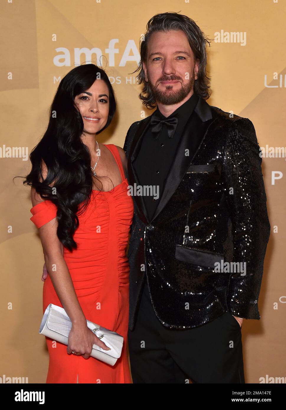 Jennifer HuYoung and JC Chasez arrive at the amfAR Gala Los Angeles at