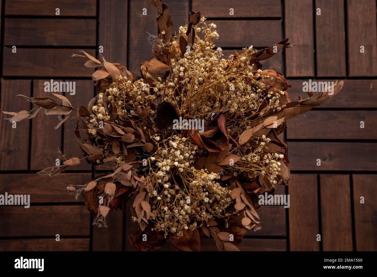 Flat Lay top view composition of dried flowers with wooden background ...
