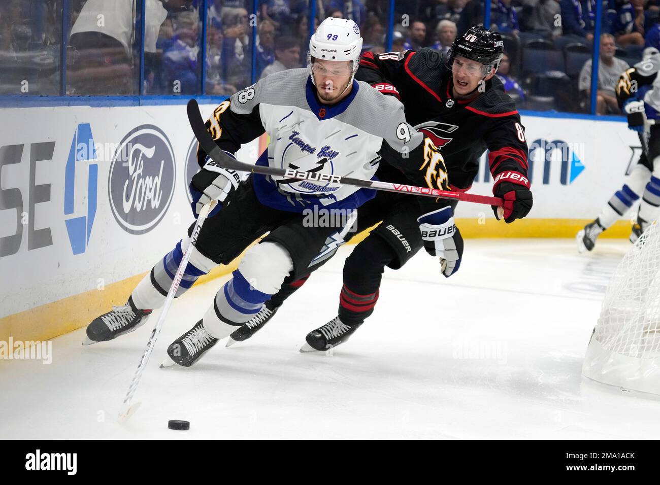 Tampa Bay Lightning defenseman Mikhail Sergachev (98) beats Carolina