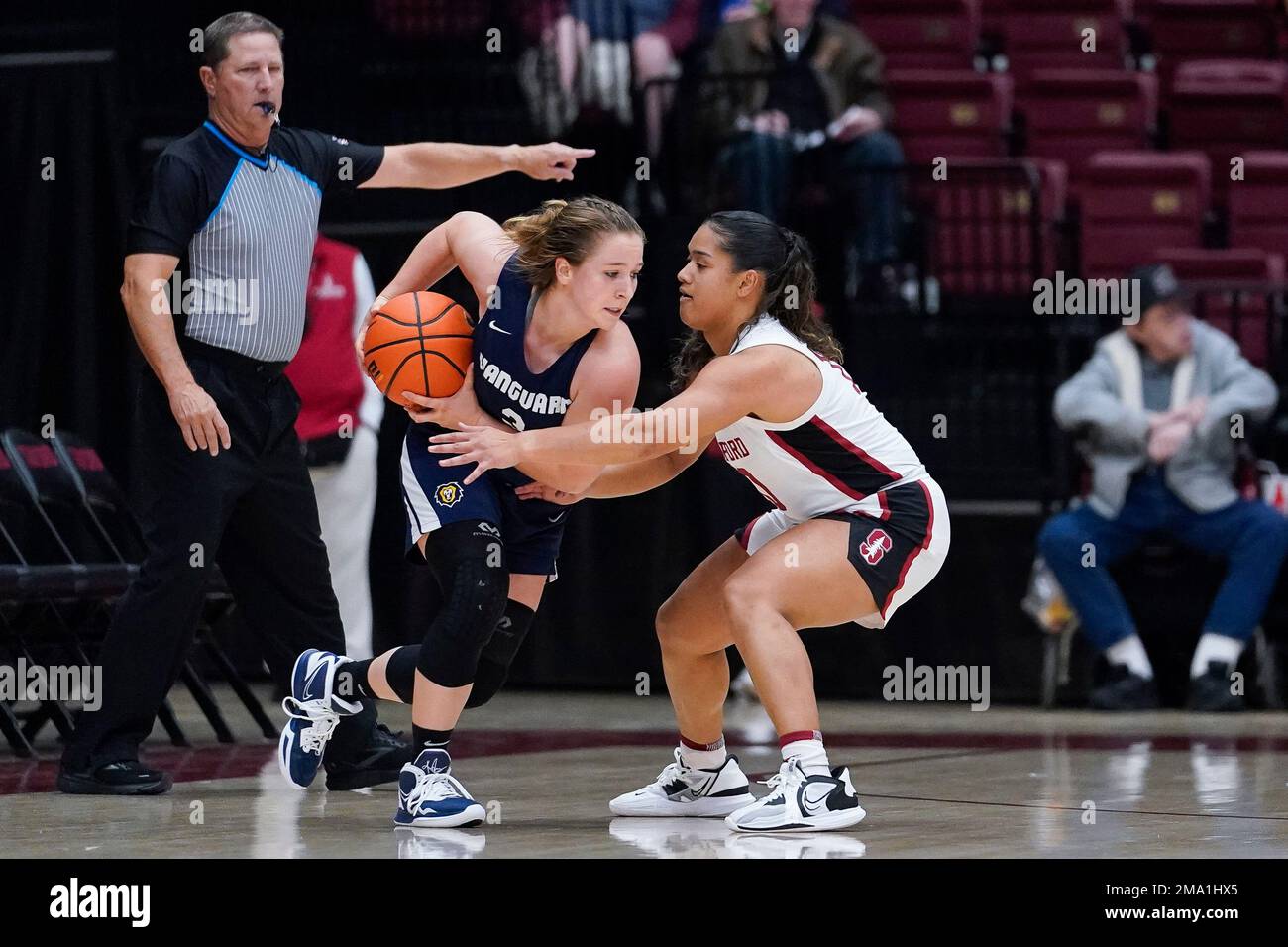 Stanford guard Talana Lepolo, right, defends against Vanguard guard