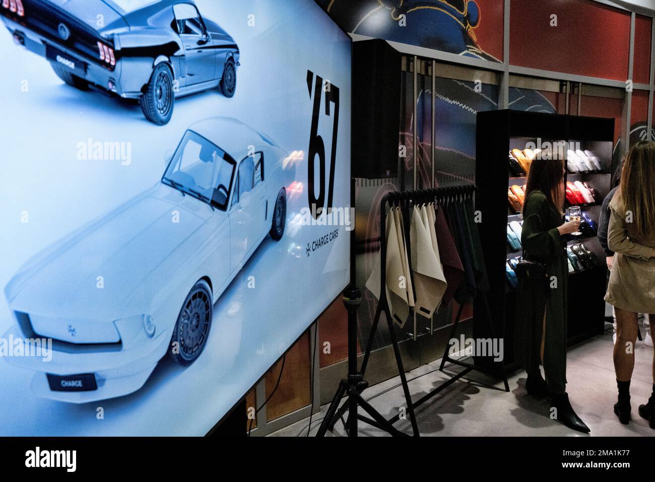 Guests view the Charge Car 67 during it s U.S. launch at the