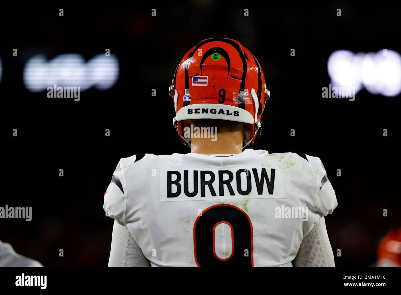 Cincinnati Bengals quarterback Joe Burrow (9) walks to the sidelines during  an NFL football gam …