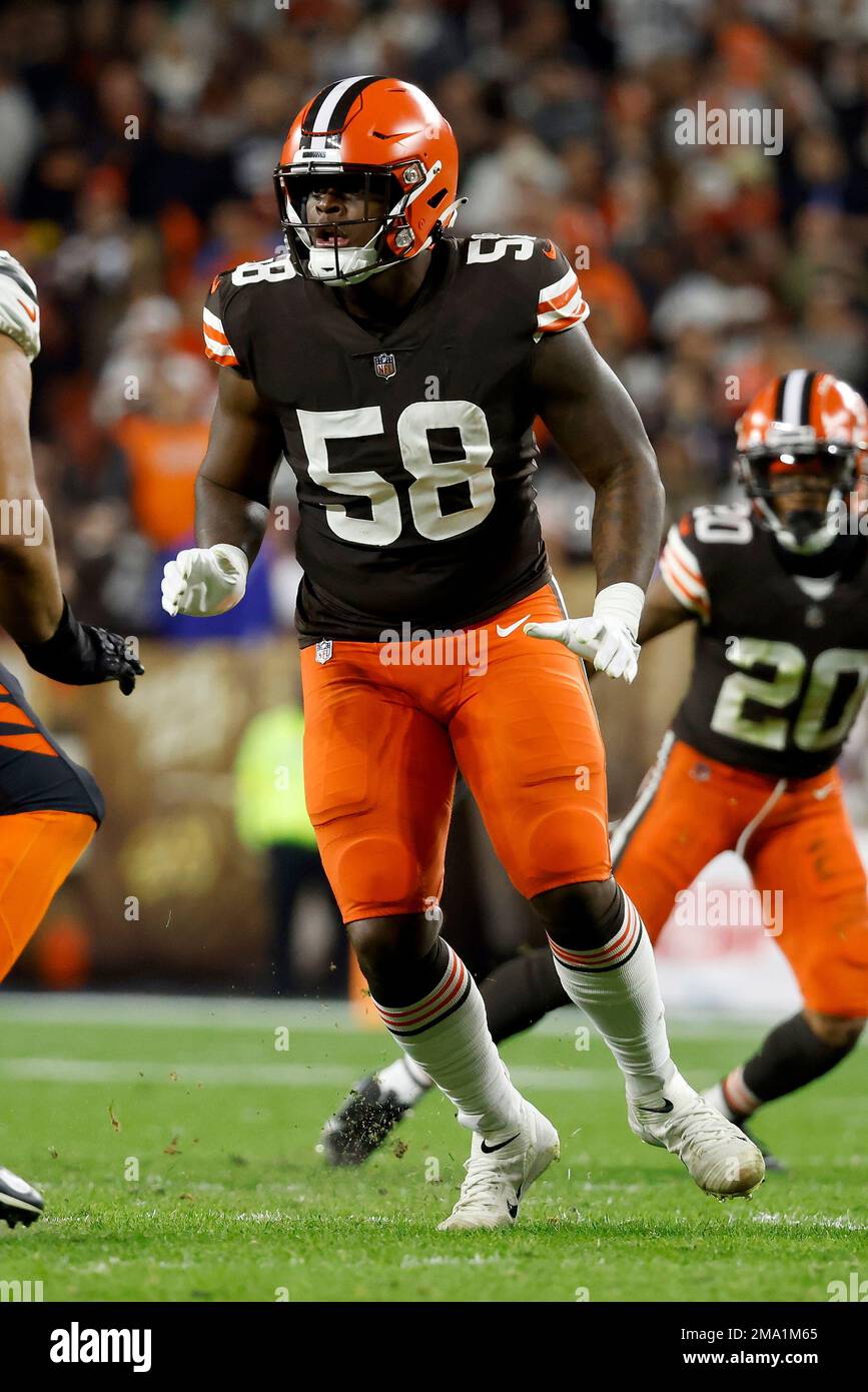 Cleveland Browns defensive end Isaiah Thomas (58) runs off of the line of  scrimmage during an NFL football game against the Cincinnati Bengals,  Monday, Oct. 31, 2022, in Cleveland. (AP Photo/Kirk Irwin