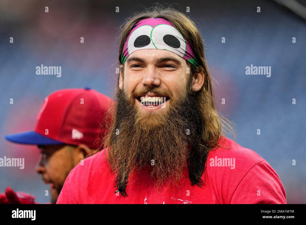 Philadelphia Phillies' Brandon Marsh smiles at Alec Bohm (28