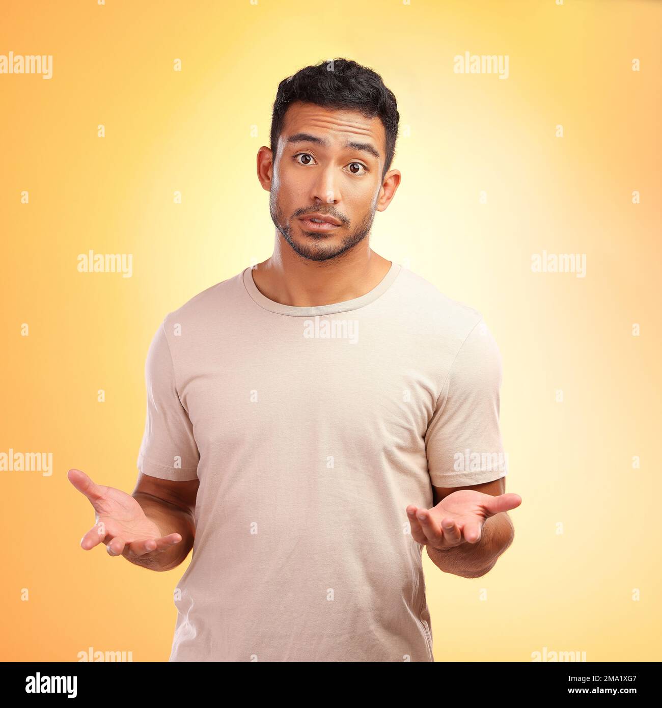 Man, confused and hands out isolated with questions and asking why on yellow background with mockup. Confusion, doubt and person from India with Stock Photo
