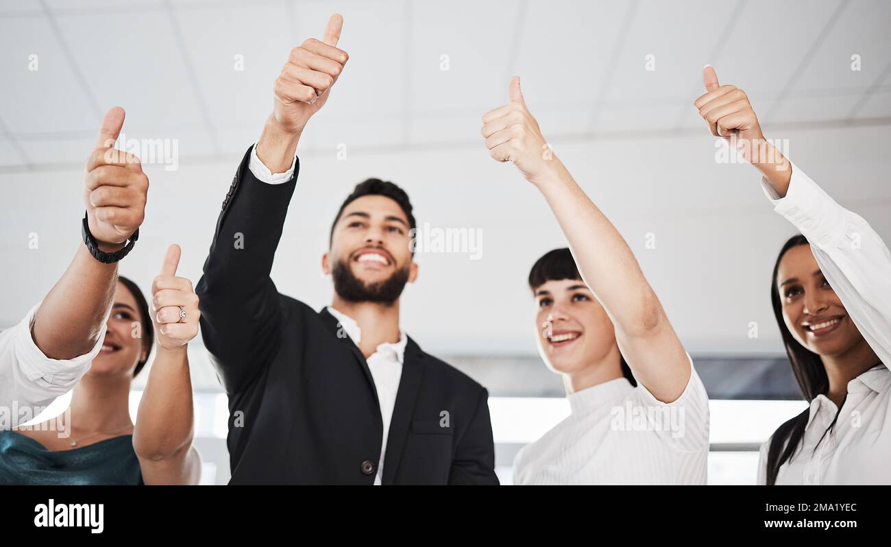 Thumbs up, winning and group people success, support or thank you hands sign. Yes, like or winner of business team, employees or worker with vote Stock Photo