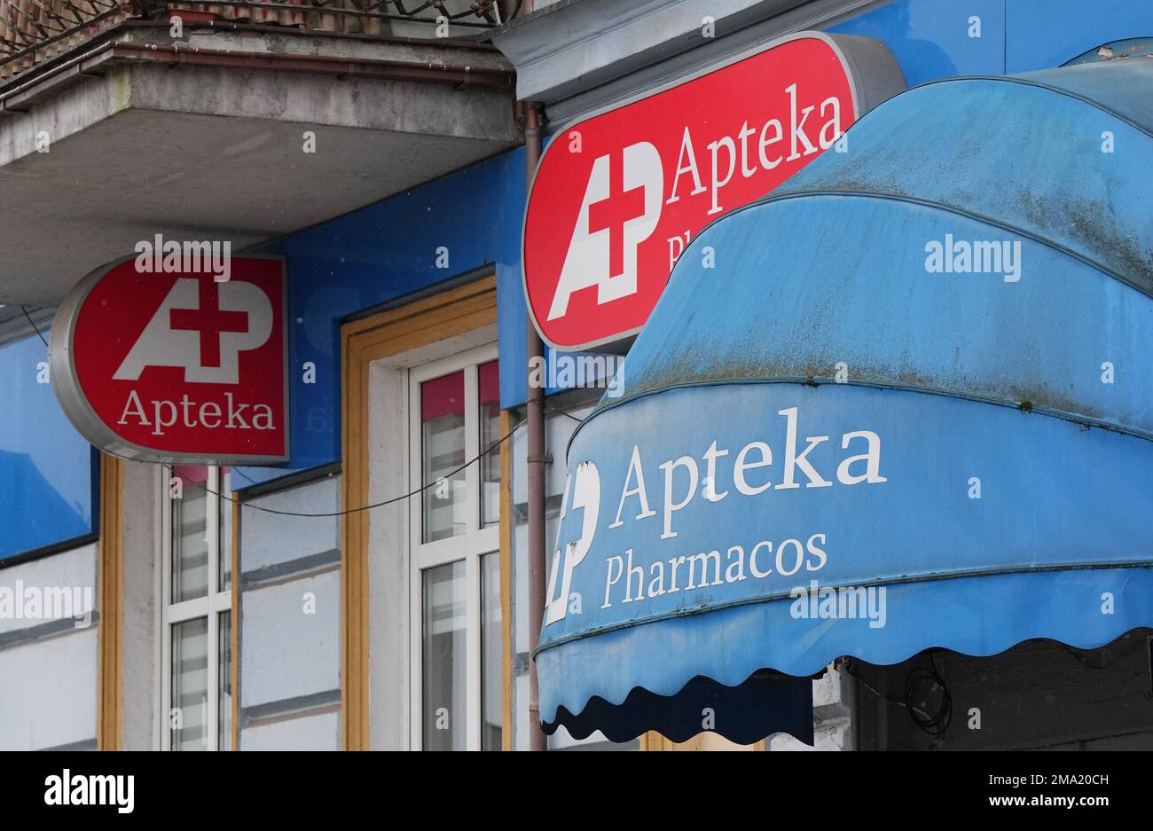 Slubice, Poland. 18th Jan, 2023. A red 'Apteka Farmacos' sign hangs above the front door to a pharmacy downtown. Credit: Soeren Stache/dpa/Alamy Live News Stock Photo