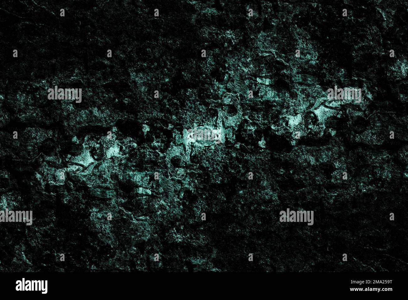 Grungy rough grunge textured dark wall surface for background Stock Photo