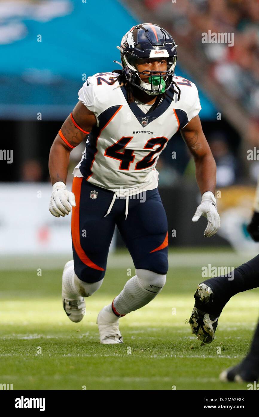 Denver Broncos linebacker Nik Bonitto runs on the field during the