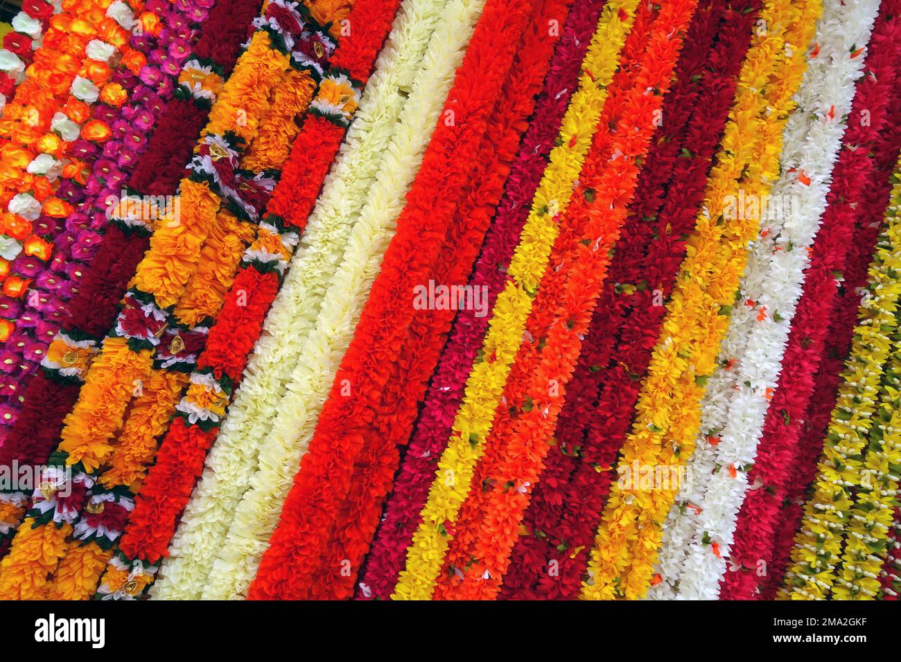 Artificial flower strands available for purchase as part of preparations for the Hindu festival of Diwali, George Town, Penang, Malaysia Stock Photo
