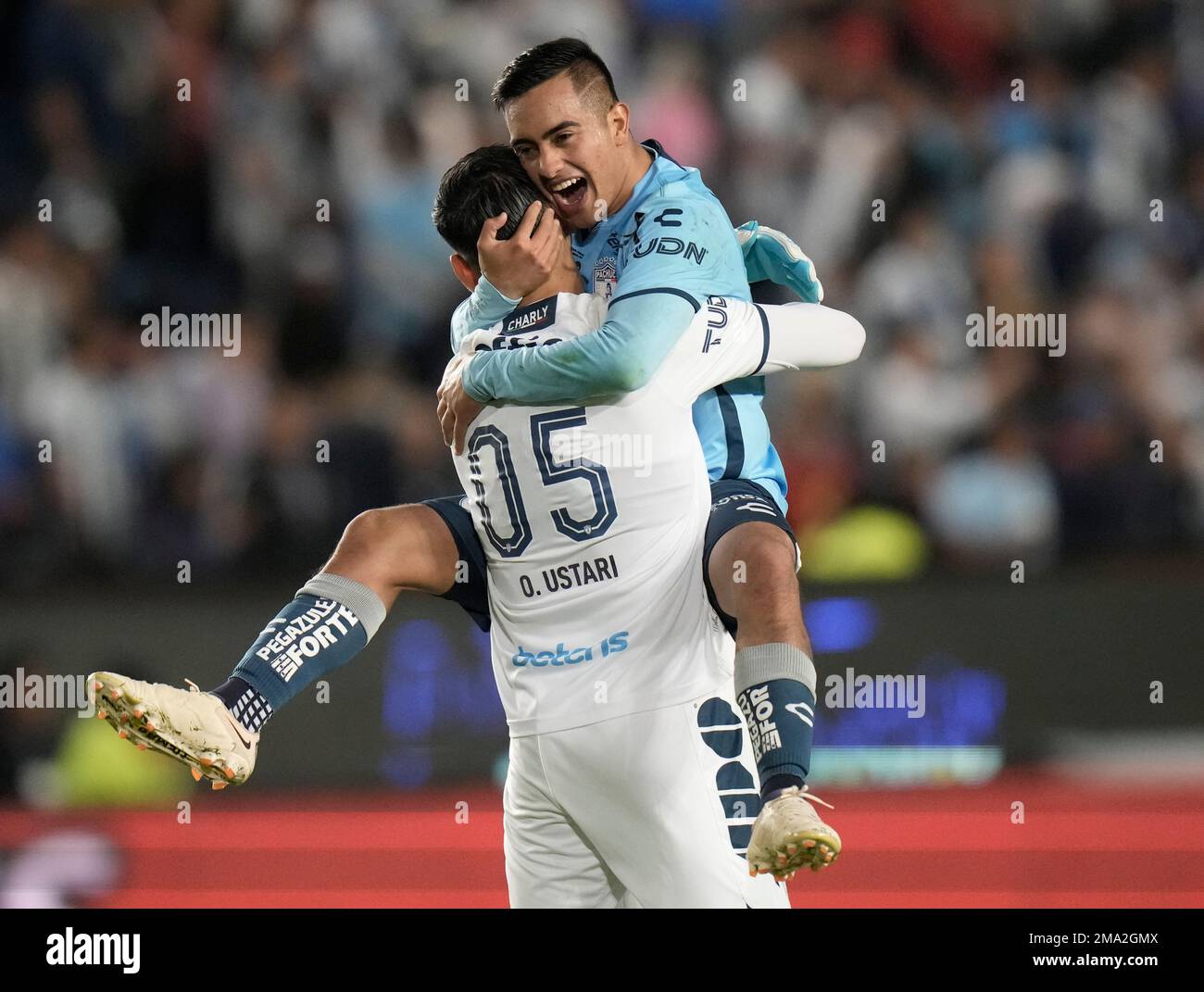 Pachuca's Erick Sanchez, right, and his teammate, goalkeeper Oscar ...